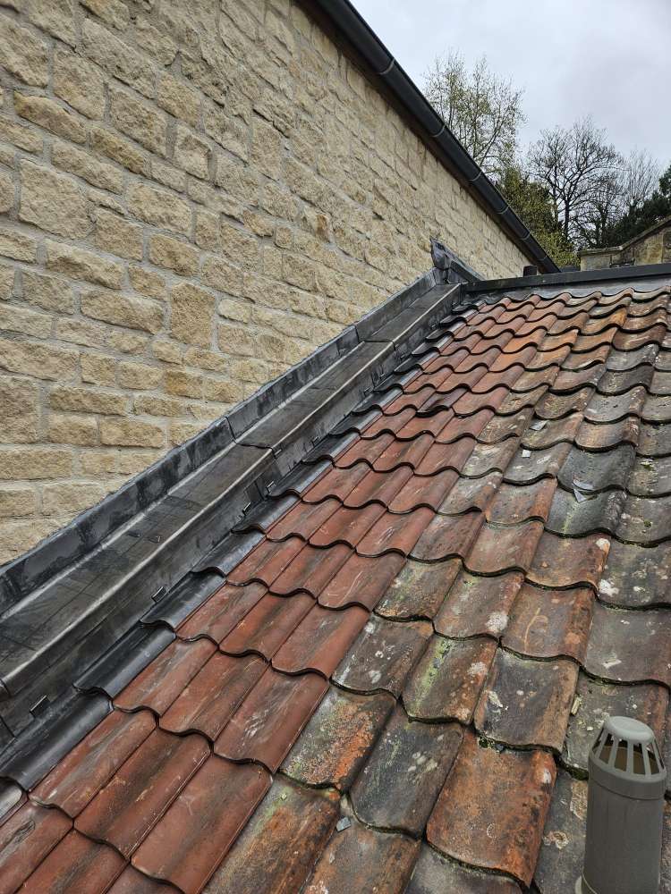 roofing project finished by skilled roofers in the Bath area with lead flashing detail